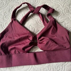 Born Primitive. Burgundy color.